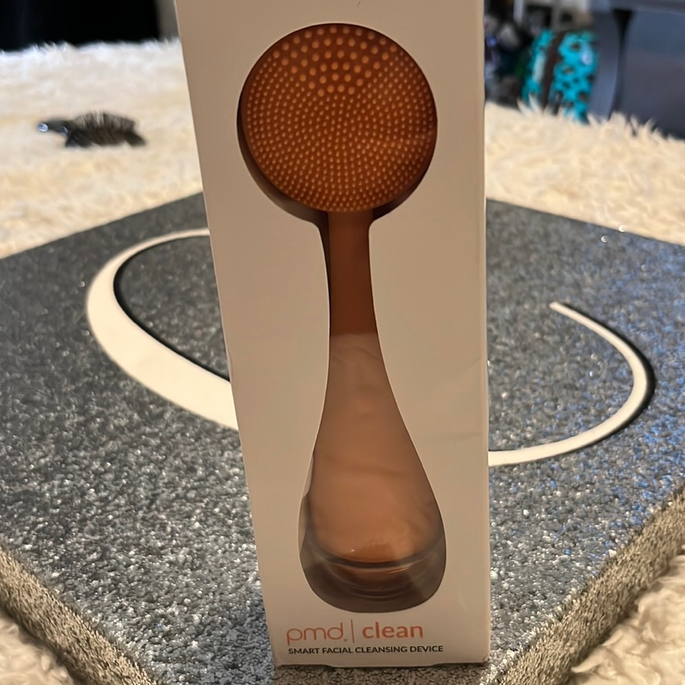 peach facial cleaning device